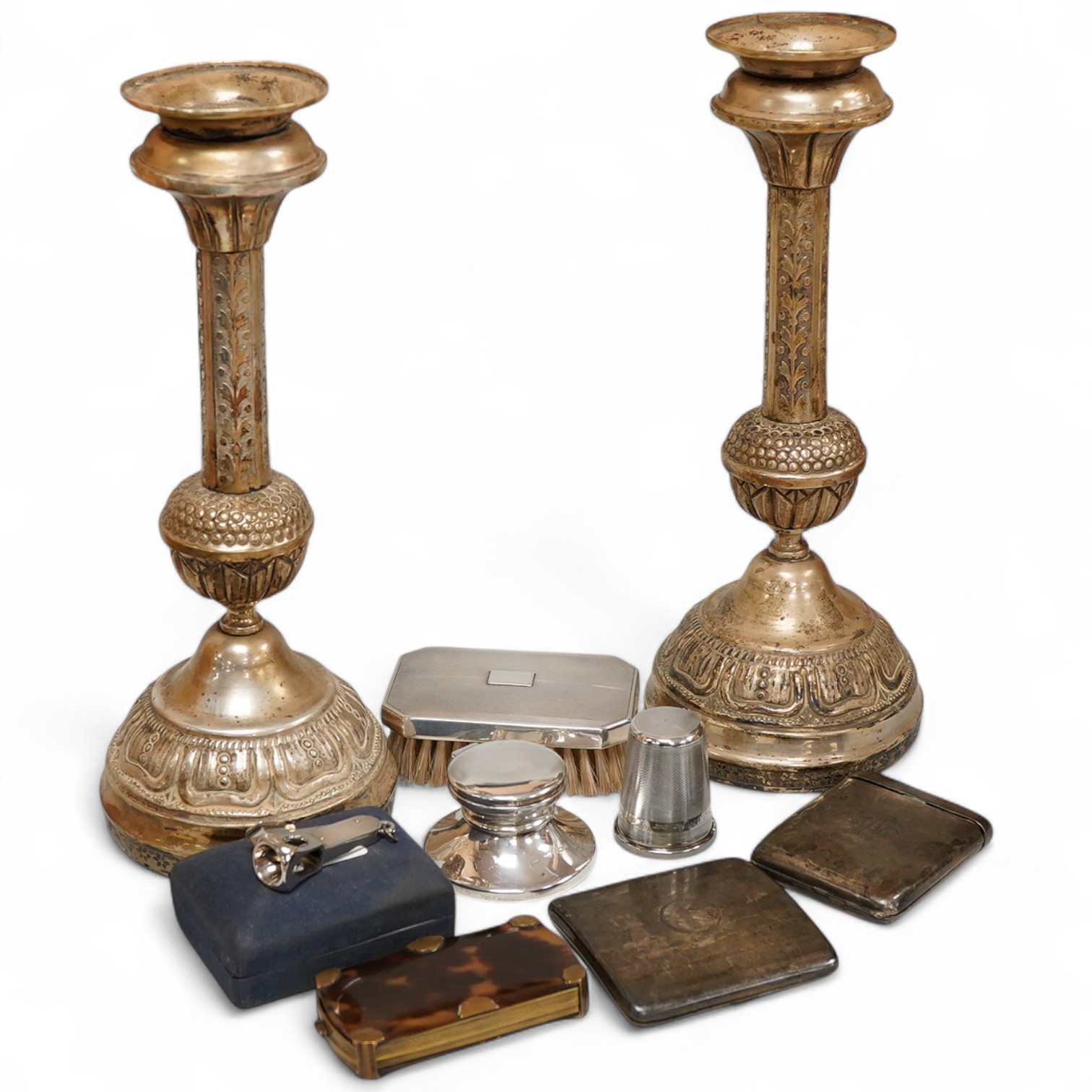 A George V silver top opening cigarette case, Birmingham, 1923, 83mm, together with a silver mounted hair brush, one other silver cigarette case, a silver mounted cigar cutter, a silver mounted inkwell, a large silver th